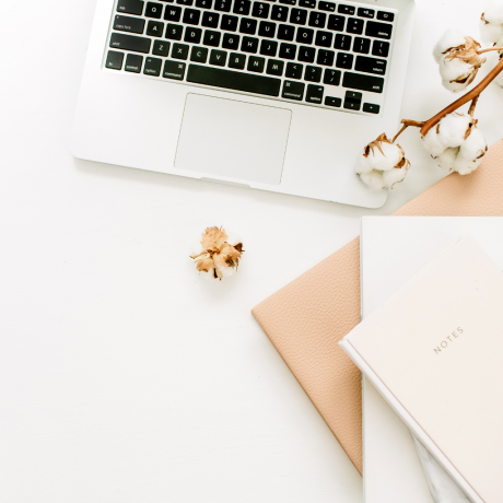 Elegant diaries by Manners with Kristina laying on a desk with laptop and flowers minimalistic